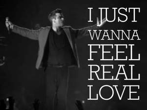 Robby Williams - I Just Wanna Feel Real Love